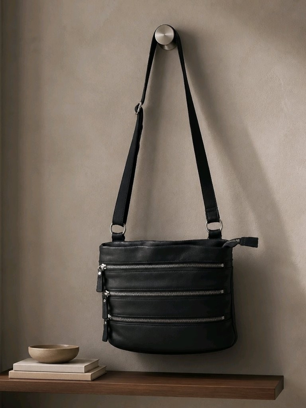 Danier Dark Navy Leather Crossbody Bag with Triple Zip Front
